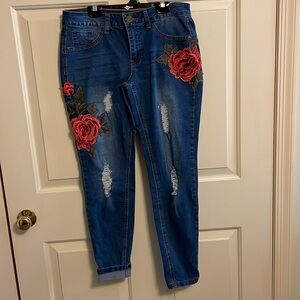 Beautifully embroidered and distressed jeans